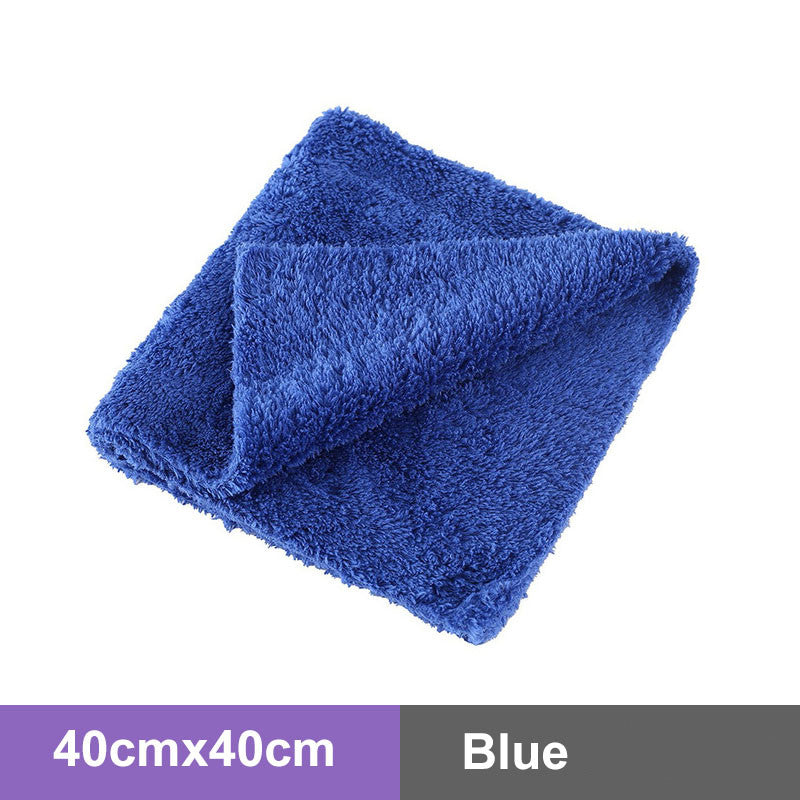 Stack of microfiber towels in three colors