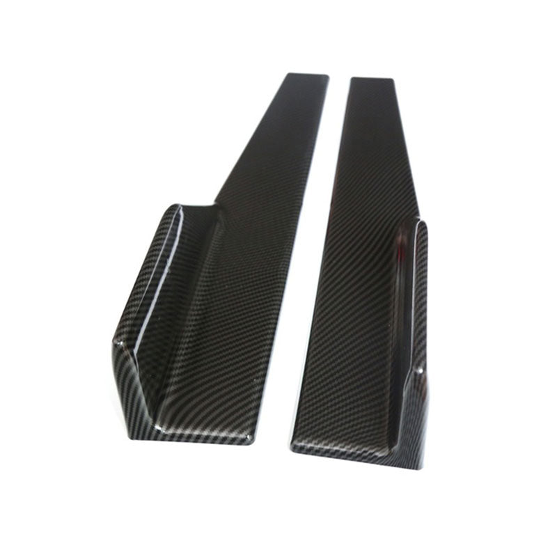 Pair of carbon-look side skirt splitters, top view