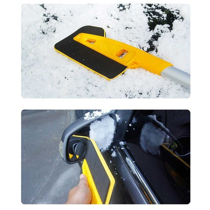 Snow shovel clearing snow and cleaning a car side mirror