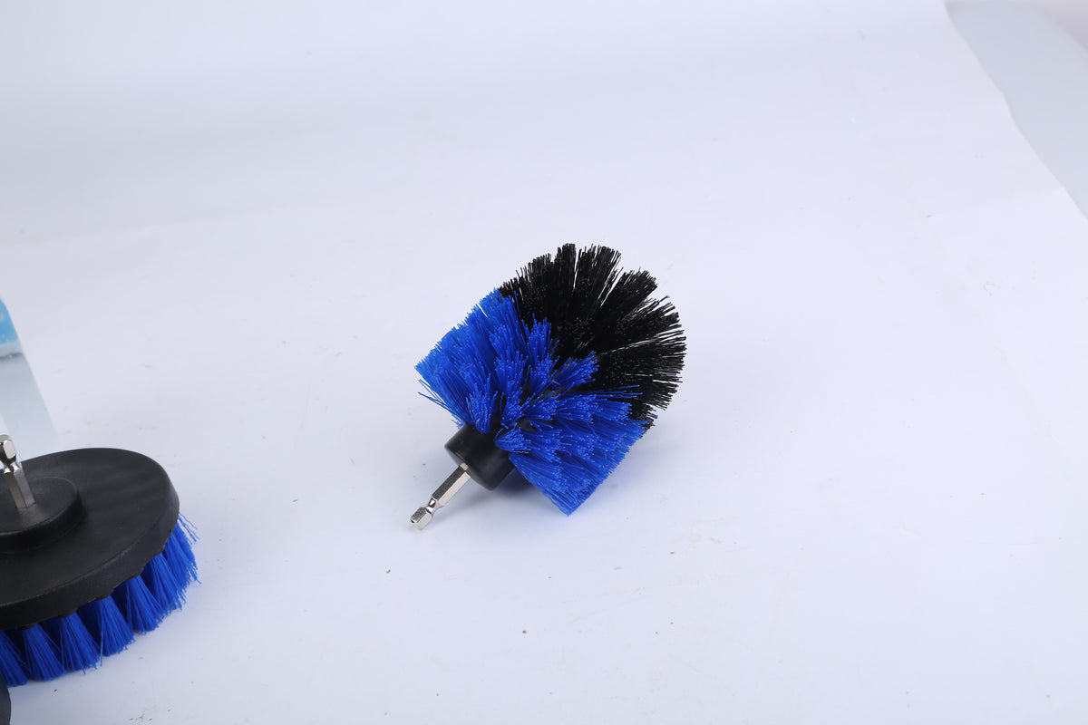 Blue and black drill brush attachments close-up